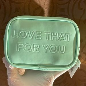 Super cute lime green small makeup bag.